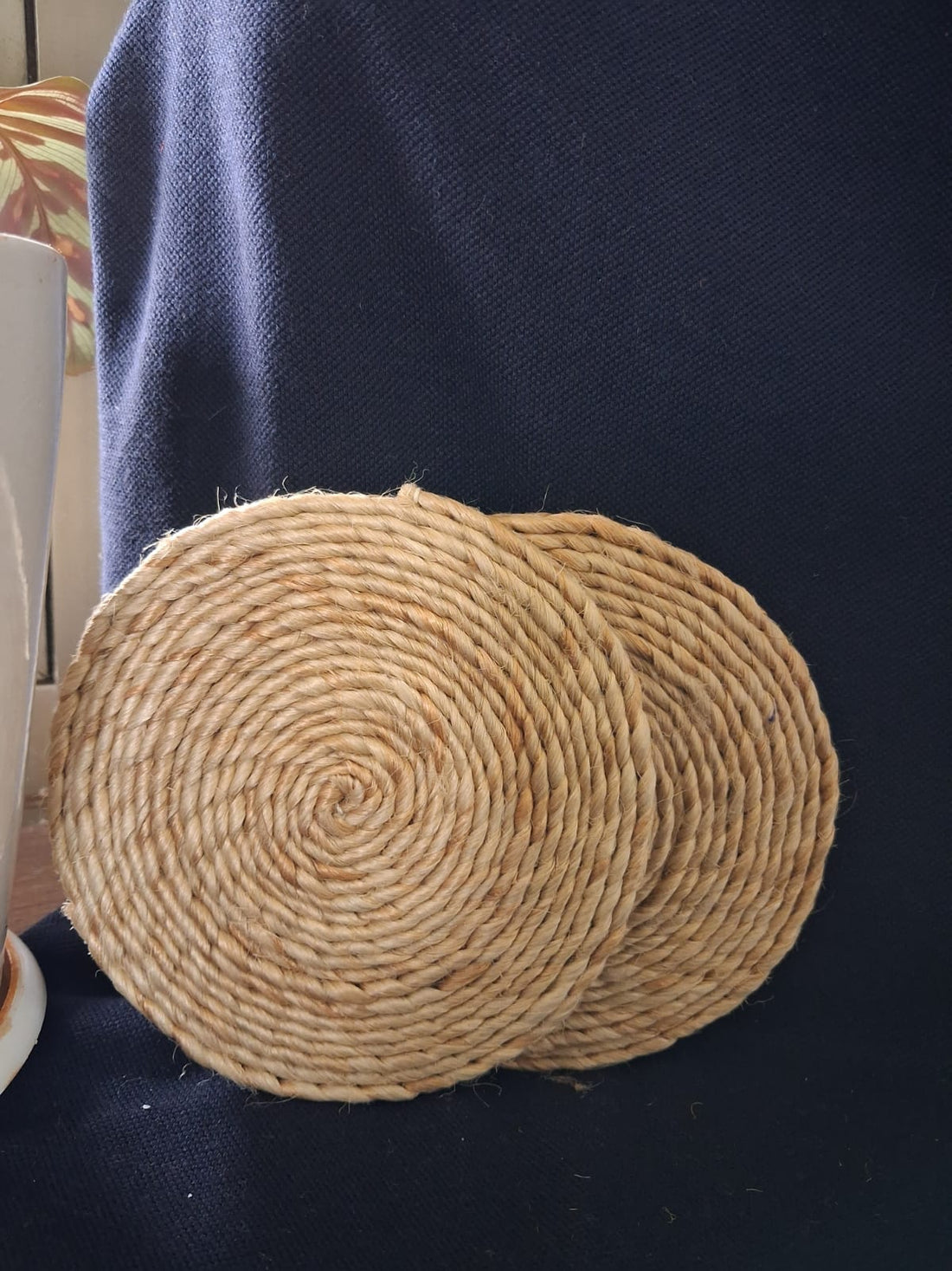 Luxury handcrafted wedding and event hamper by The 369 Gift Company — stiff lotus trunk box with paper grass bed and greeting card, including Urli Oudh candle, festive tealight holders, mini Diya box, resin shimmer coasters, Jasmine bath salt blend, Ferrero Rocher, healthy date bites, and German silver elephants. Perfect for weddings, events, and festive gifting.